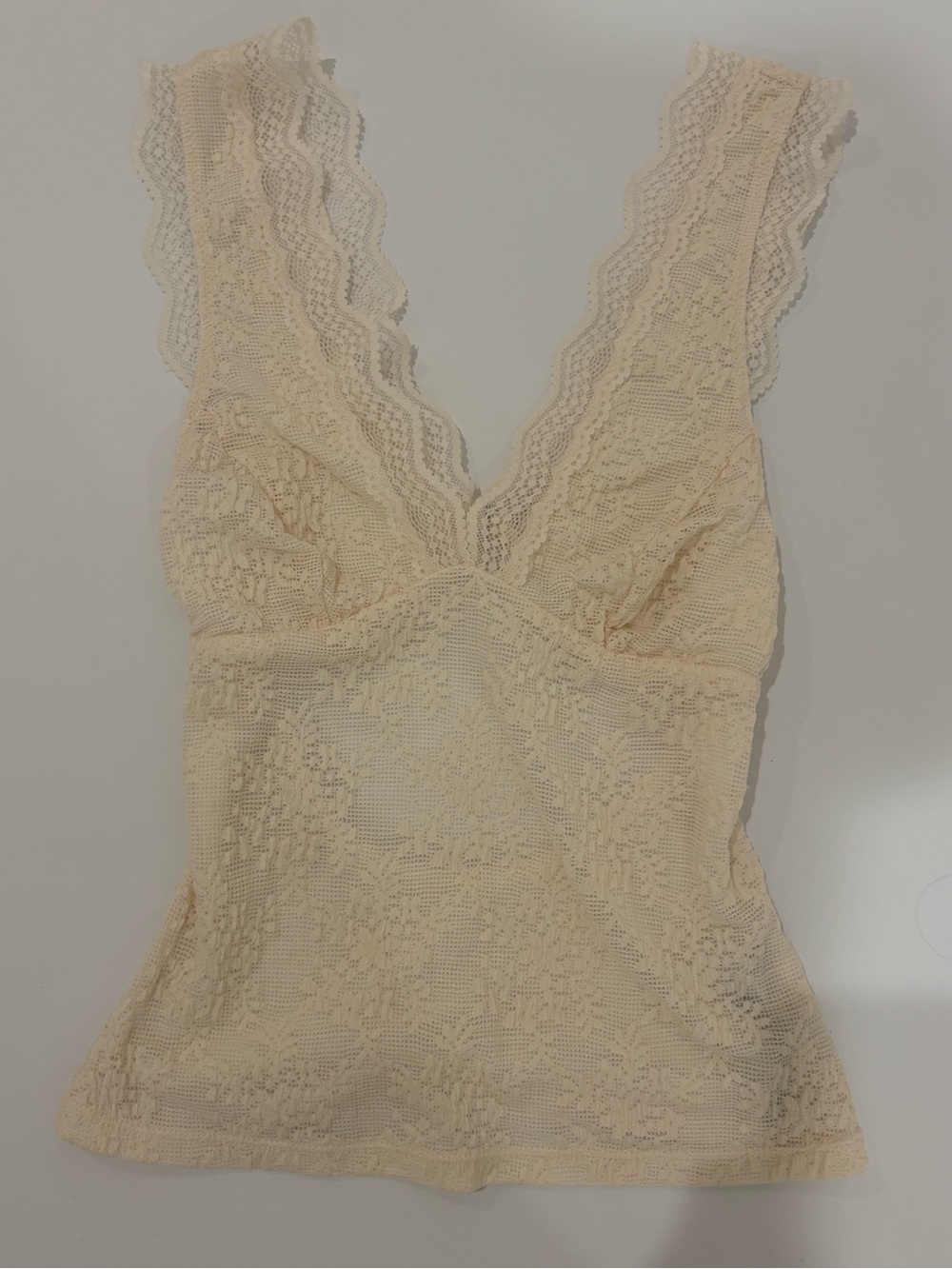 Free People “Loved You First Lace Cami” in crème